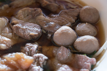 Close up of Braised beef and meat clear soup.