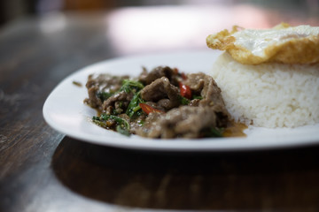 Rice with stir-fried beef and basil. (thai street food)