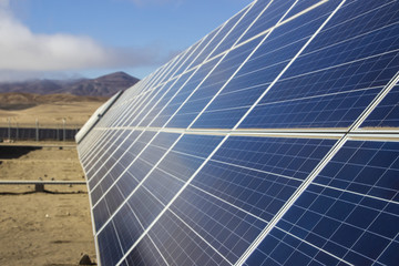 Obraz premium PV Modules Solar Energy, a clean technology to reduce CO2 emissions and the best place for Solar Energy is the Atacama Desert at north Chile where all the astronomical observatories are placed