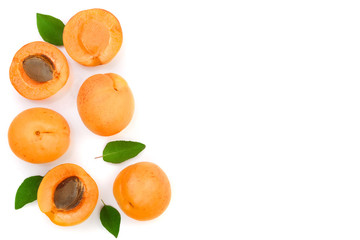 Apricot fruits with leaves isolated on white background with copy space for your text. Top view. Flat lay pattern