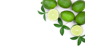 sliced lime vith leaves isolated on white background with copy space for your text. Top view. Flat lay pattern