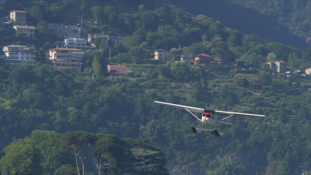Floatplane taken off from Lake Como in Italy