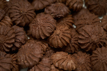 Cookies and sweet biscuits on white plate background, top view 
