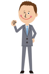 ポップなグレーのスーツの短髪ビジネスマンがガッツポーズ