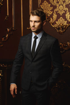 imposing man in suit