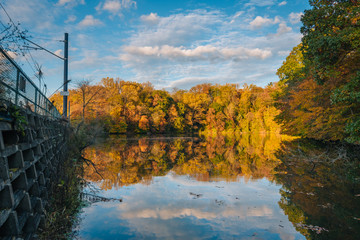 Autumn color at Lake Roland at Robert E Lee Park in Baltimore, Maryland