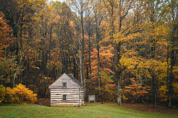 Cabin and autumn color at Peaks of Otter, on the Blue Ridge Parkway in Virginia.