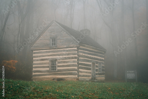 Cabin In Fog And Autumn Color At Peaks Of Otter On The Blue Ridge