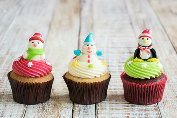 Christmas of cupcake on the wooden.