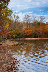 Fototapeta na wymiar Autumn color at Loch Raven Reservoir, in Cockeysville, Maryland.