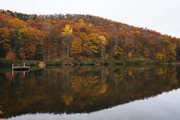 Autumn color at Sherando Lake, near the Blue Ridge Parkway in George Washington National Forest, Virginia.