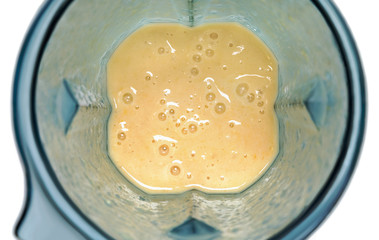 Tonifiyng smoothie. Smoothie in blender with white background to