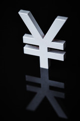 yen symbol on black background