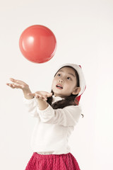 A asian girl portrait with christmas balloon isolated white.