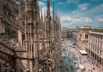 View of the busy Piazza del Duomo from the Milan Cathedral rooftop. Lombardy, Italy.