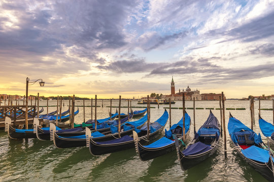 Venice sunrise city skyline and Venice Gondola boat, Venice Italy