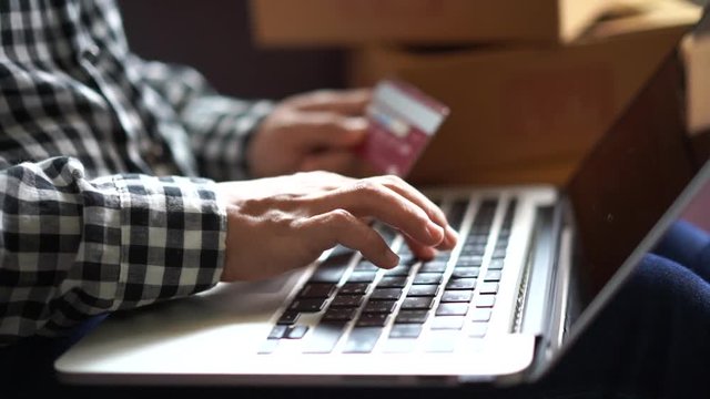 Women using laptop computer with credit card for online shopping