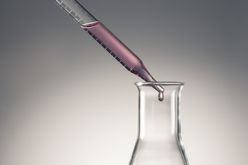 experiment equipment(spuit) on the black background.