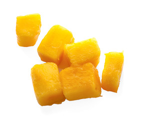 Mango fruit with mango cubes and slices.