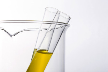 beaker and cylinder closeup isolated white.