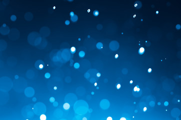 Dark blue abstract backgrounds with bokeh.