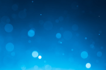 Dark blue abstract backgrounds with bokeh.