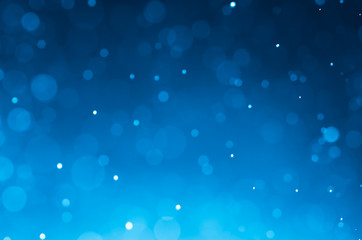 Dark blue abstract backgrounds with bokeh.