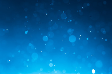 Dark blue abstract backgrounds with bokeh.