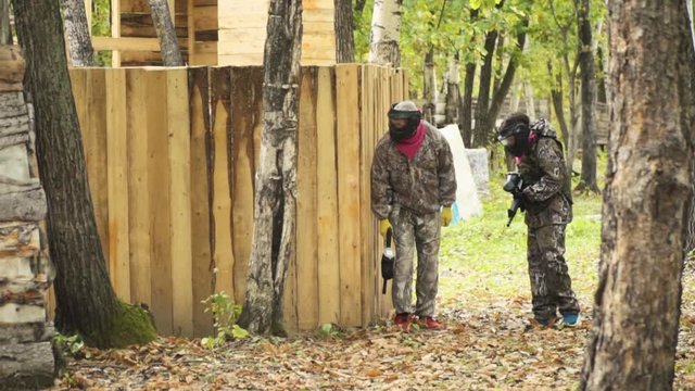 playing paintball in the Woods