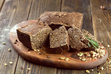 baked bread on wooden table background