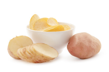 crispy chips and raw potato on white background