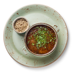 Soup kharcho, isolated on white background, view from above