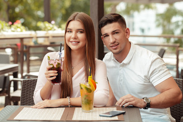 Two people in cafe enjoying the time spending with each other