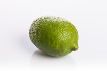 fresh green lime isolated white
