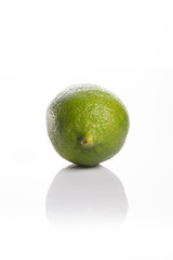 fresh green lime isolated white
