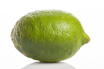 fresh green lime isolated white