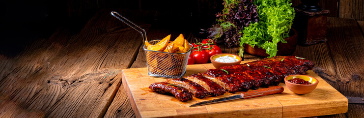 BBQ spare ribs from a charcoal grill