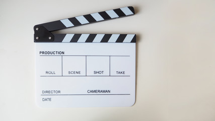 Fototapeta na wymiar Clapper board or movie slate use in video production or movie and cinema industry. It's white color on white background.