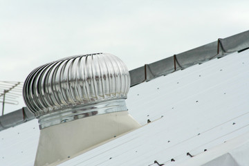 Ventilator on the zinc roof tecnology outdoor background