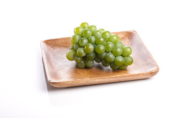 green grapes on the white background.