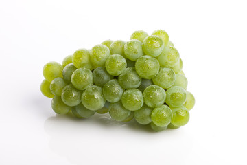 green grapes on the white background.