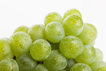 green grapes on the white background.