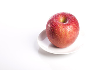 red apple on white background.