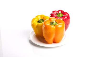 bell pepper on the wood table, grey background.