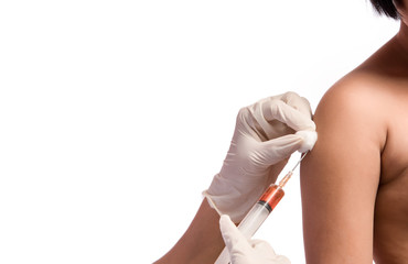 doctor or nurse vaccinating to kid