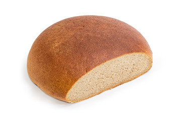 Partly cut wheat and rye hearth bread on white background