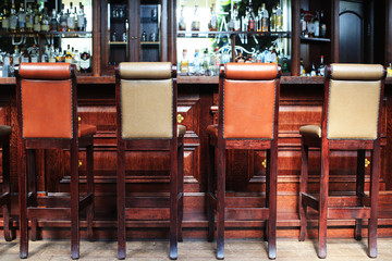 Classic bar with bar counter and chairs