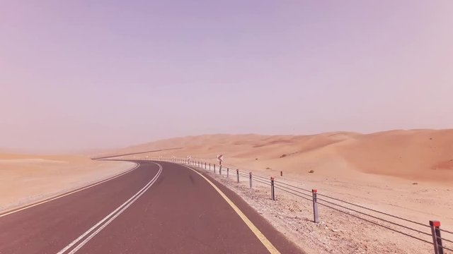 New road from Oasis Liwa to Moreeb Dune in Rub al Khali desert stock footage video