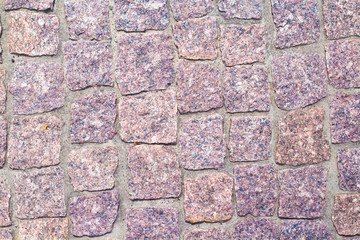 fragment of granite pavers in different color schemes