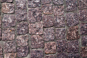 fragment of granite pavers in different color schemes